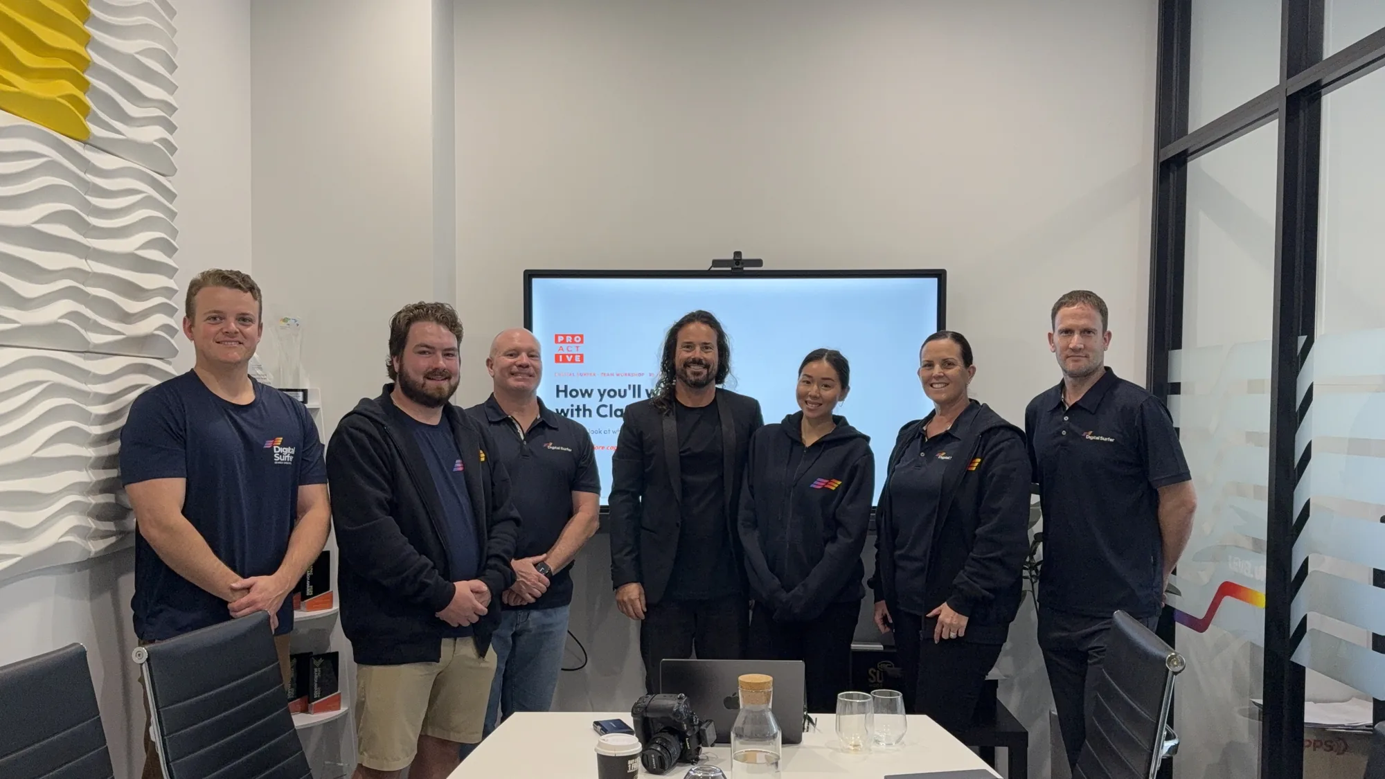 The Digital Surfer team with Chris Hogan at their Burleigh Heads office during the AI workshop